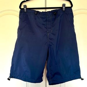 Men’s navy 24” shorts, 100% poly. NWT